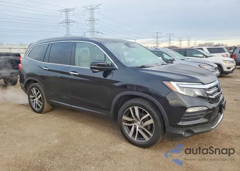2017 Honda Pilot Touring z USA, uszkodzony, nr VIN 5FNYF5H9XHB042397